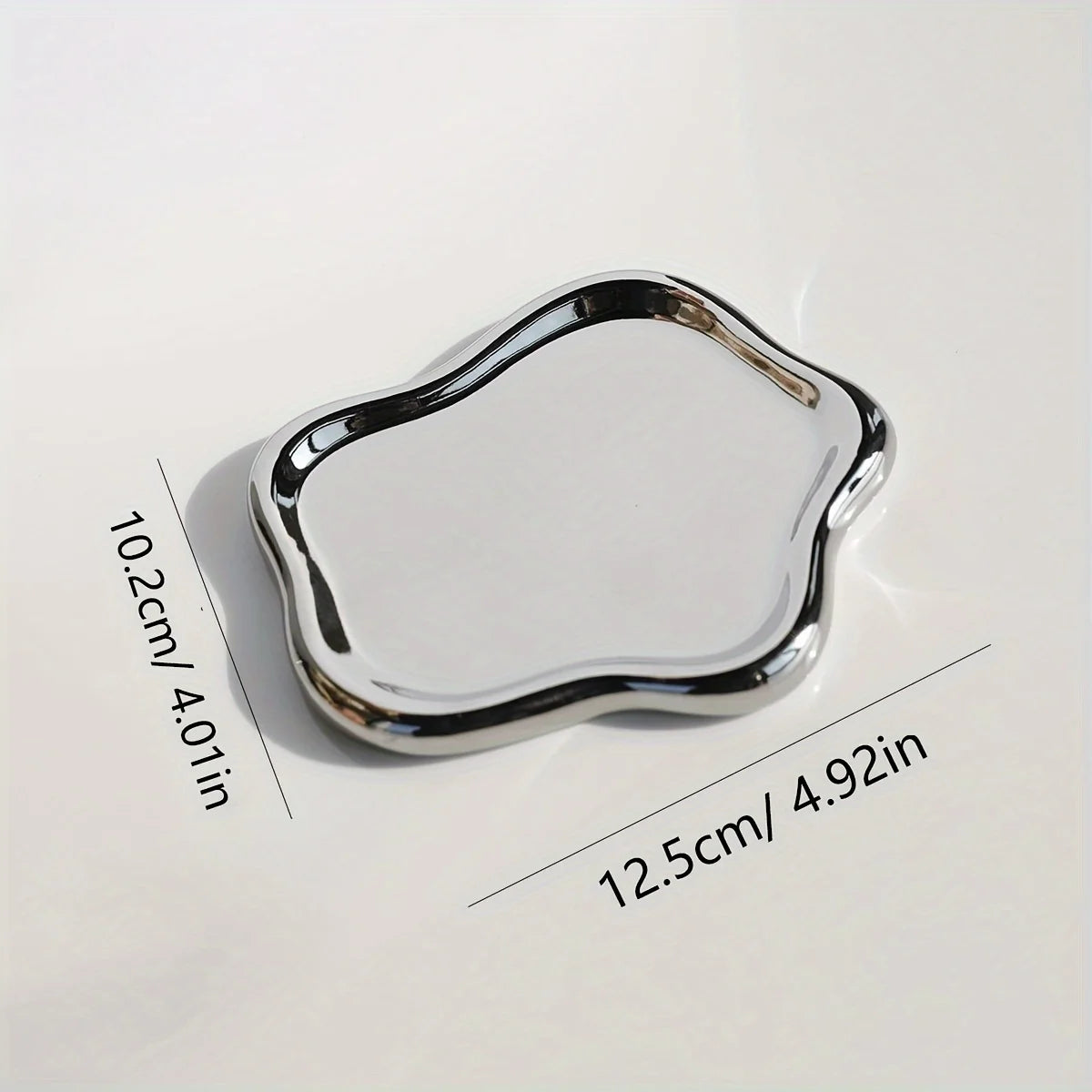 Silver tray with dimensions labeled on a white background